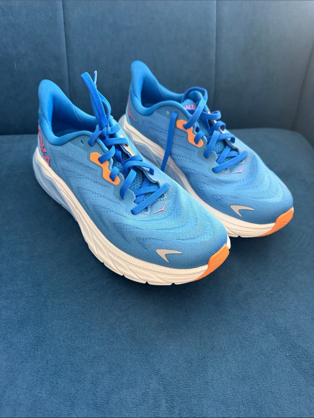 Women’s Hoka Blue Running Shoes with Orange Accents